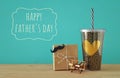 Image of black cup with golden heart. Father& x27;s day concept. Royalty Free Stock Photo