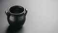 Black handmade ceramic empty jar on the table