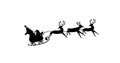 Image of black silhouette of santa claus and christmas tree in sleigh being pulled by reindeer o Royalty Free Stock Photo