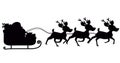 Image of black silhouette of santa claus in sleigh being pulled by reindeer on white background Royalty Free Stock Photo