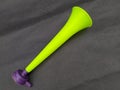 Blank vuvuzela stadium plastic horn. fan vuvuzela trumpet isolated on seamless background