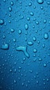 Image Blue background adorned with water drops on textured fabric surface Royalty Free Stock Photo