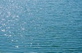SUNLIGHT GLITTERING ON THE SURFACE OF DAM WATER Royalty Free Stock Photo