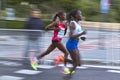 Image blurred fast half marathon runners.