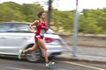 Image blurred fast half marathon runners.