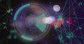 Image of blurred traffic lights over processing circle, connections and dark space