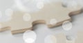 Image of bokeh over beige puzzle