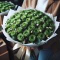 image of a bouquet of many Green roses in wrapping paper.