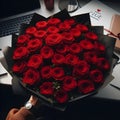 an image bouquet of many Red roses in wrapping paper.