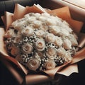 an image bouquet of many white roses in wrapping paper.