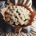 an image bouquet of many white roses in wrapping paper.