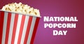 Image of box of popcorn over national popcorn day text Royalty Free Stock Photo