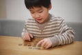 Boy counting coins