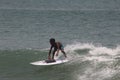 The boy learn surfing in Lagos popular beach, Tarkwa bay, Lagos Nigeria Royalty Free Stock Photo