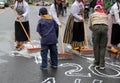 Image of boy scouts helping young ladies begin street sweeping, annual Tulip Festival,Albany,New York,2016