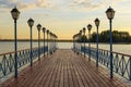 Bridge over the lake Valdai at sunset Royalty Free Stock Photo