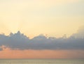 Bright Golden Sunrays through Clouds in Sky, Blue Sea Water and Horizon - Natural Background Royalty Free Stock Photo