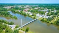 Bright summer day aerial PFW college campus and Ron Venderly Family Bridge over St Mary River Royalty Free Stock Photo