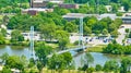 Bright summer day over PFW college campus Ron Venderly Family Bridge with buildings and river aerial Royalty Free Stock Photo