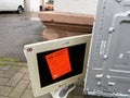 An image of a broken computer monitor on a standabandoned on a s