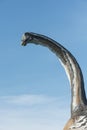 Portrait of a brontosaurus over blu sky