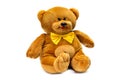 Image of brown toy teddy bear sitting at white isolated background Royalty Free Stock Photo