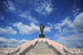 Image of buddha stand is the sign symbol peace Buddhism and religion of thailand on blue sky cloud background day prepare for Royalty Free Stock Photo