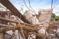 Image of a building under demolition. Concrete, bricks and steel beams. Royalty Free Stock Photo