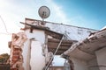 Image of a building under demolition. Concrete, bricks and steel beams. Royalty Free Stock Photo