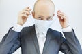 Image of business man wearing anti bacterial mask against virus and pollution