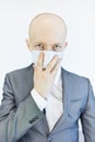 Image of business man wearing anti bacterial mask against virus and pollution