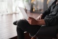 image of a business owner using a laptop in his store. Royalty Free Stock Photo