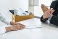 Image of business woman hand sending a resignation letter to his boss and boss refusing, change of job, unemployment, resign Royalty Free Stock Photo