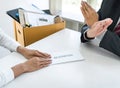 Image of business woman hand sending a resignation letter to his boss and boss refusing, change of job, unemployment, resign Royalty Free Stock Photo