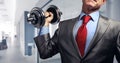 Image of businessman in suit raising dumbbell. Tax burden concept Royalty Free Stock Photo