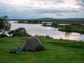 Image of camping side with tents and bicycles at the lake Royalty Free Stock Photo