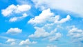 Beautiful blue sky and white fluffy clouds. Natural background. Concepts of freedom, peaceful, heaven, natural phenomenon, etc.