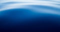 Close-up of Rippling Blue Water Surface with Subtle Light Reflections ocean lake Royalty Free Stock Photo