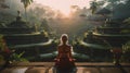 back of woman sitting and meditating in bali