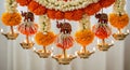 Vibrant Diwali decoration with flowers and diyas Royalty Free Stock Photo