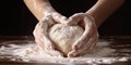 Women\'s hands knead dough