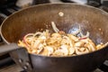 Sauteing Sliced Mushrooms and Onions in a Hot Pan Royalty Free Stock Photo