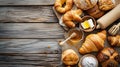 Assorted Baked Goods on Rustic Wooden Table - Cozy Bakery Scene Royalty Free Stock Photo