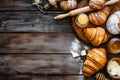 Assorted Baked Goods on Rustic Wooden Table - Cozy Bakery Scene Royalty Free Stock Photo