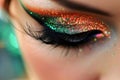 Close-Up View of a Womans Eye With Colorful Glitter Makeup in Natural Daylight Royalty Free Stock Photo