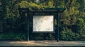 Blank advertising space at a bus stop surrounded by lush greenery Royalty Free Stock Photo