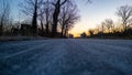 Twilight Journey: Low-Angle View on a Countryside Road