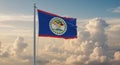 The national flag of belize waving proudly against a backdrop of fluffy white clouds and a blue sky Royalty Free Stock Photo