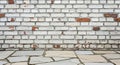 Rustic white brick texture with old stone paving Royalty Free Stock Photo