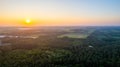 Sunset Horizon Over Verdant Forest Royalty Free Stock Photo